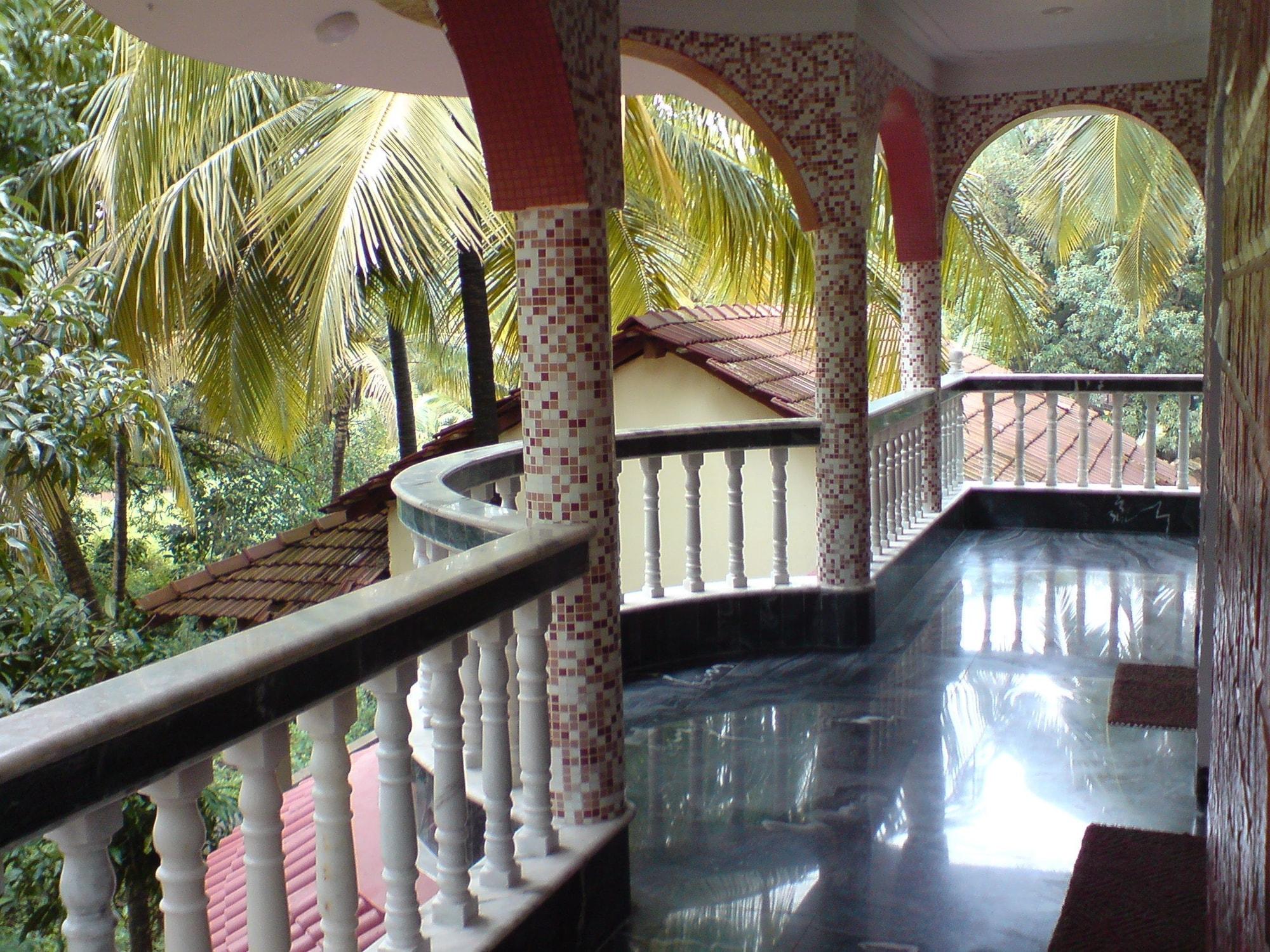 Mama Mids Home Morjim Esterno foto